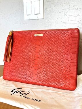 Gigi New York reptile orange leather Uber clutch